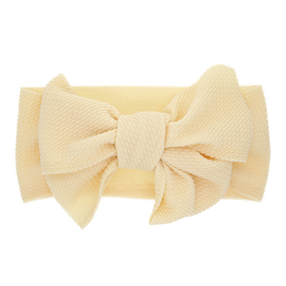 New-born baby's solid-colored bow headband