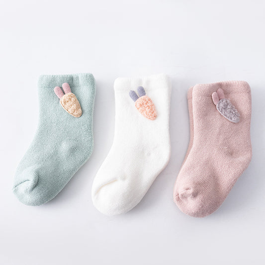 Children's socks in towel tube