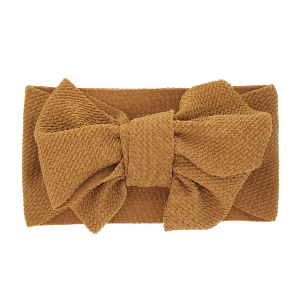 New-born baby's solid-colored bow headband